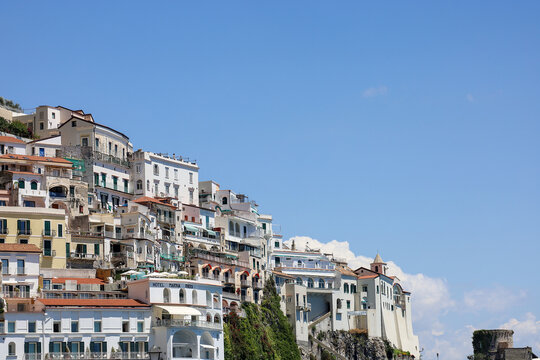 AMALFI, ITALY on AUGUST 25, 2024. Picturesque Cliffside Buildings and Boutique Hotels on Amalfi Coast.