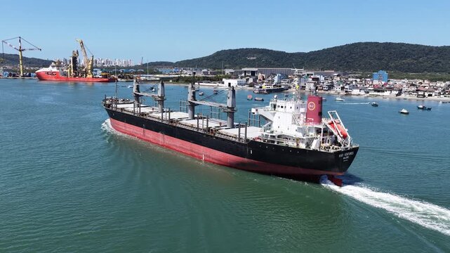 Freight Ship At Santos In Sao Paulo Brazil. Port Of Santos Scenery. Cargo Ship. Maritime Transportation. Freight Ship At Santos. Freight Ship Sailing.