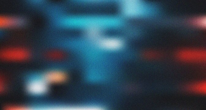 Vibrant abstract blend of blue red and orange blurred lights creating a dynamic colorful futuristic background