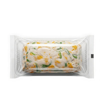 Fresh daisy flower soap bar in clear packaging. Handmade natural floral beauty product with transparent wrap for skincare and gifts.