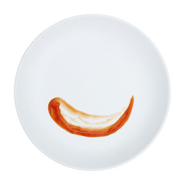 red chili sauce decoration on white circle plate isolated on white.