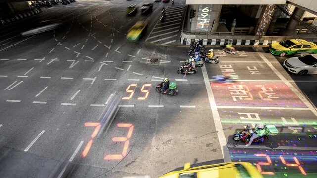 traffic in central bangkok with code and data overlayed in the buildings 