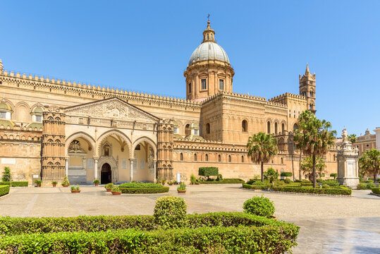 Palermo Cathedral with historic architecture and palm trees
