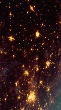 The scene shows bright city lights in a dark landscape taken from space at night. Urban areas appear illuminated, with clusters of lights highlighting populated regions.