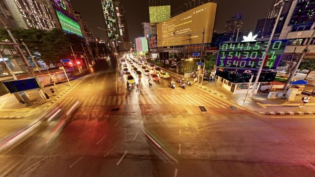 traffic in central bangkok with code and data overlayed in the buildings 