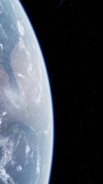 A view of Earth taken from space shows parts of land and ocean. The planet appears bright against the black backdrop of space. The image captures the curvature of the Earth.