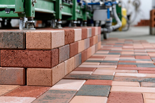 Brick making process in a factory setting