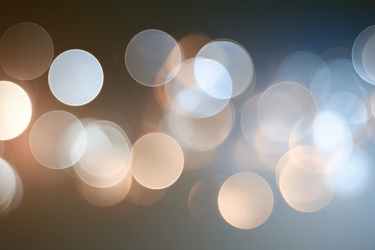 Soft, glowing circles of light blur against a gradient background