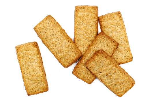 Wholemeal cookies pile isolated on white background, top view