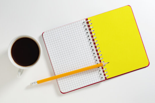 Coffee, Notebook and Pencil Flatly