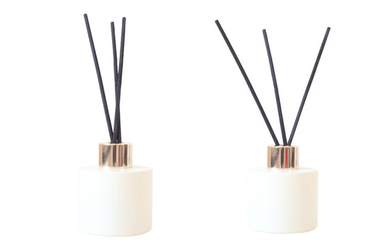 white ceramic reed diffuser bottle with silver collars and black scent sticks, png, isolated on transparent background for interior design
