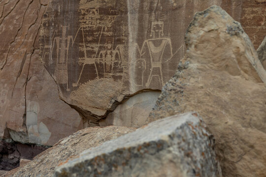 Ancient Petroglyphs on Sandstone Rock
