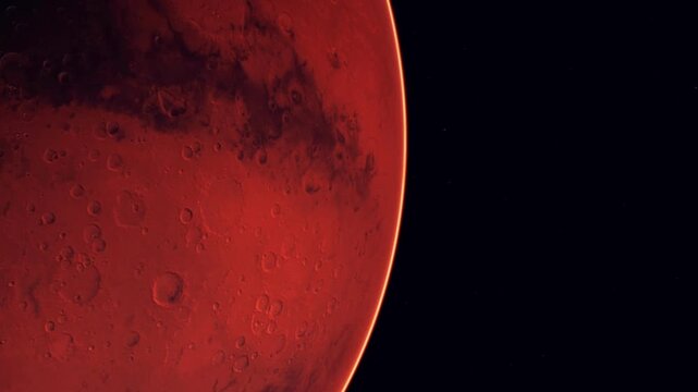 The scene shows the planet Mars with its distinct surface details captured at night. The red color highlights the rocky features and craters visible on the planet.