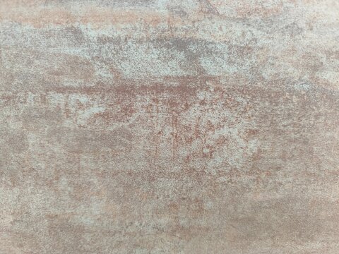 Close up view of rustic terracotta tile texture with weathered brown pattern and ceramic surface
