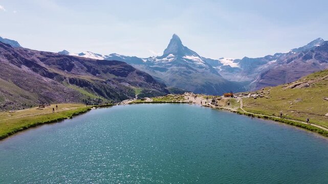 Aerial drone view of a mountain lake along the Five Lakes Trail in the Swiss Alps