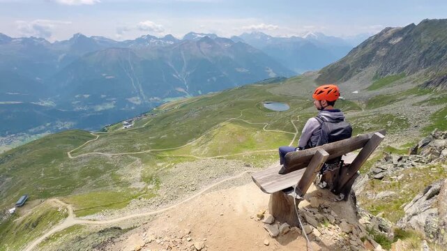 Climbers crossing the via ferrata above the Great Aletsch Glacier in the Swiss Alps