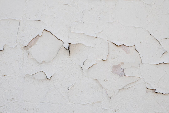 A wall that has cracks on it