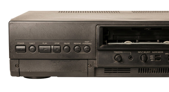 Vintage VCR player with visible buttons and tape deck mechanism