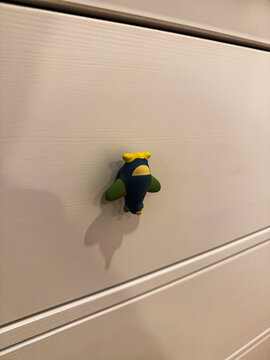 Airplane-shaped cabinet pull