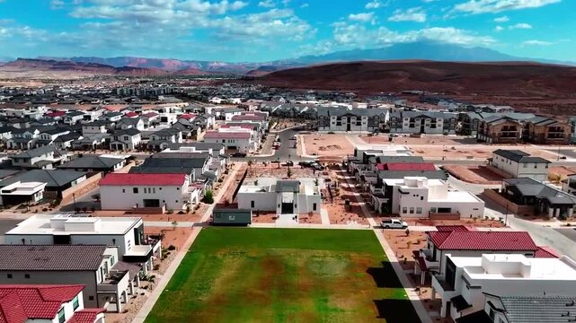 Aerial View of Modern Suburban Housing Development in Desert Landscape