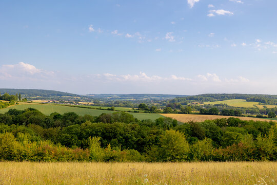 Summer landscape, The terrain of hilly countryside, A hamlet on hillside with green grass meadow and tree, Eys is a village in the municipality of Gulpen-Wittem and region in Zuid-Limburg, Netherlands