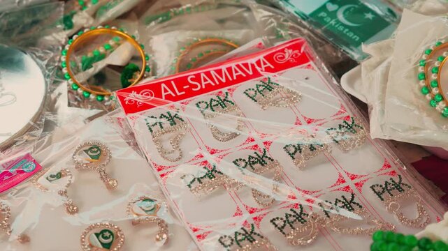 Stall shot of pakistan badge 14 august Detail Shot of Green and White Party Displayed for Sale in Pakistan