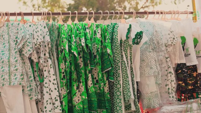 Independence Day Printed Dresses and Shirts Hanging at Street Clothing Stall Pakistan