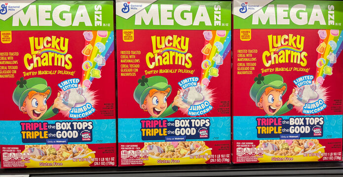 General Mills Lucky Charms cereal display at a grocery store. General Mills has removed artificial colors from Lucky Charms.