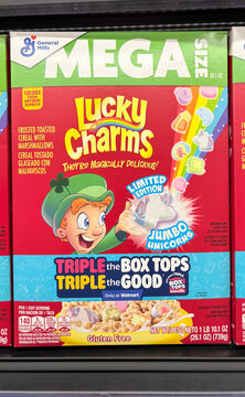 General Mills Lucky Charms cereal display at a grocery store. General Mills has removed artificial colors from Lucky Charms.