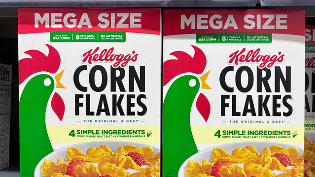 Kellogg's Corn Flakes cereal display at a grocery store. Kellogg's has removed artificial colors from Corn Flakes.
