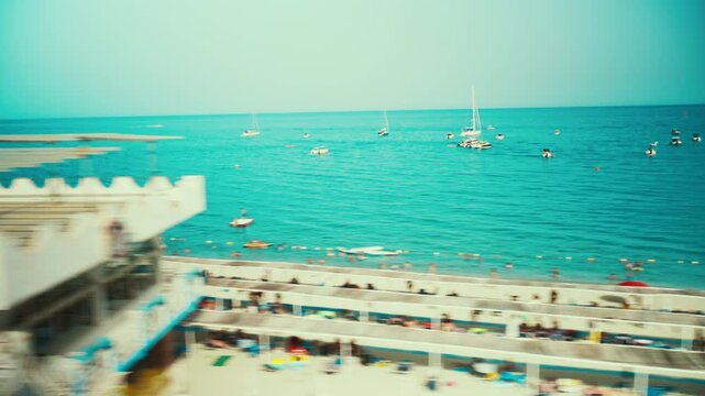 Beach near Soverato, seen from the train during a summer seaside trip