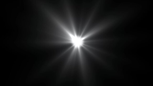 Animated white lens flare and radiant light burst effect on transparent background. Alpha channel included