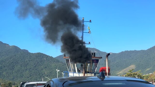 Ferry Boat Exhaust Emitting Smoke During Crossing, Highlighting Maritime Transport and Air Pollution