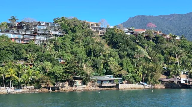 Beautiful Coastal Landscape of Ilhabela, Brazil, with Boats, Tropical Vegetation and Mountains