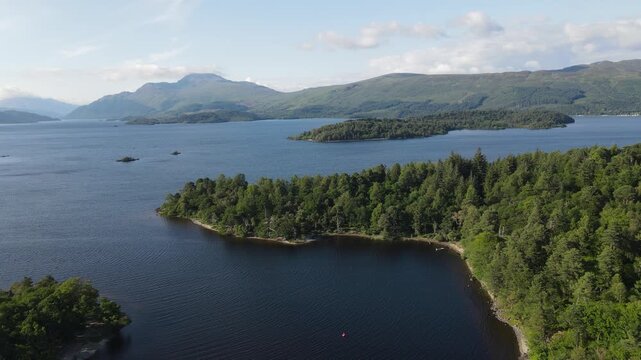 Smooth Aerial Descent from Height into the Narrows of Loch Lomond with Ben Lomond Beyond