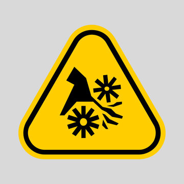 Warning sign symbol for falling debris and hazardous impact, isolated on a yellow triangular background.