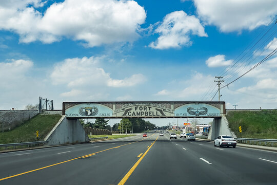 A railroad bridge crossing Ft. Campbell Boulevard in Clarksville, Tennessee, on a partly sunny day in late March. Copy space is in the image.