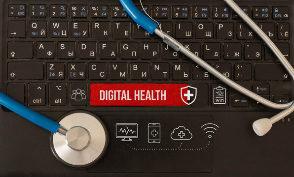Digital Health and Telemedicine Technology Concept with Stethoscope and Laptop.