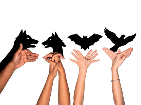 Creative Halloween shadow puppets of wolves, a bat, and a bird made with hands PNG Isolated on transparent background