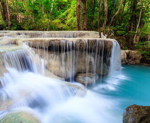 Turquoise tiered waterfall pool in lush tropical jungle environment with waterfall turquoise tropical outdoors ©  SobuzForge