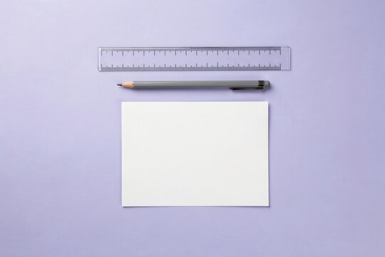 Minimalist white paper, clear ruler and pencil on pastel purple background, clean office supplies for creative projects