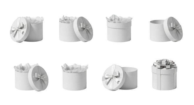 white gift boxes with ribbons opened and closed arranged against a white backdrop for presentational purposes