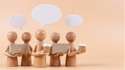 Five wooden figures with laptops and speech bubbles, symbolizing teamwork or communication. © joeycheung