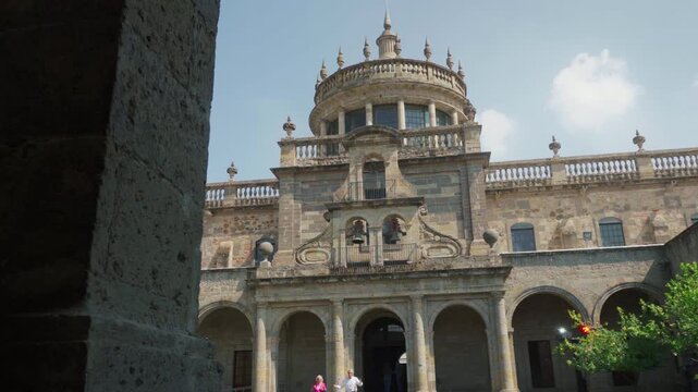 Cabanas Museum main tower and imposing neoclassical facade viewed during daylight, with tourists walking beside the historic building and revealing its monumental architecture and cultural heritage