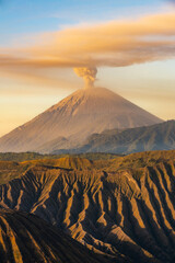 Scenery view of Mount Semeru volcano, Indonesia's highest and most active volcano on Java, frequently emits smoke, ash, and steam plumes. © boyloso