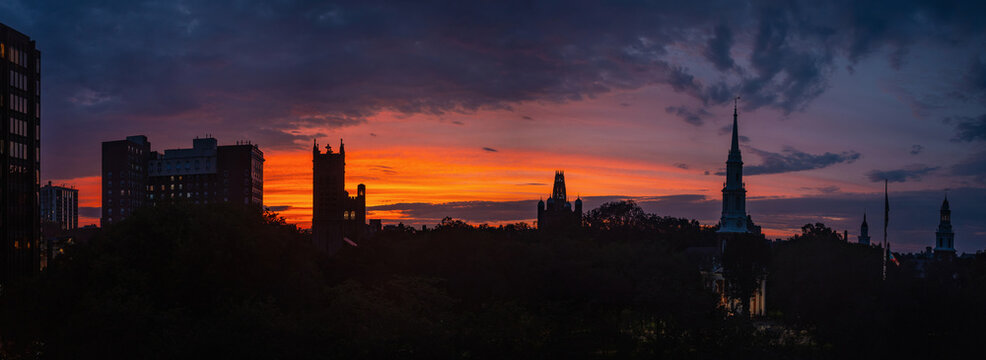 Dramatic sunset skyline over New Haven Green and church steeples in Connecticut