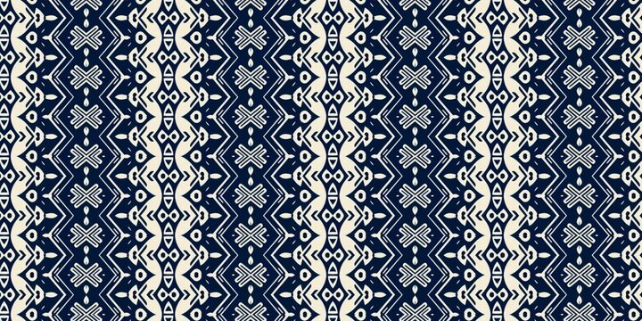 Traditional indigo navy blue and cream geometric chevron tribal seamless pattern for classic folk art textiles.