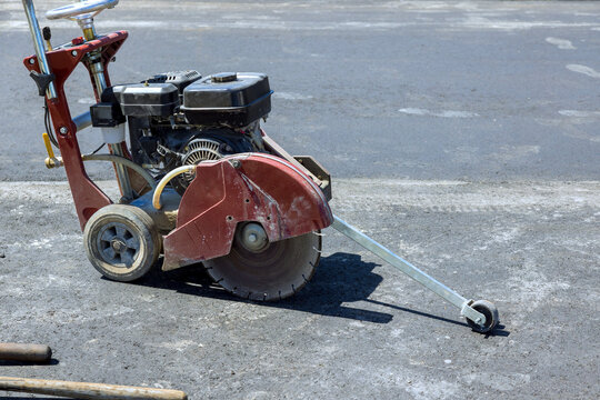 Saw machine used for cutting pavement in construction site