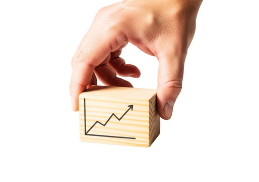Hand holding wooden block with upward trending business growth chart on transparent background.