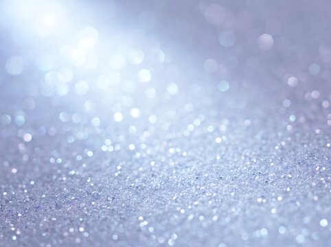 Silver glitter abstract background with soft glowing light spot glitter dust texture shimmer effect